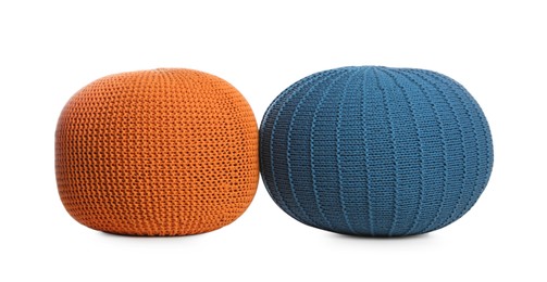 Photo of Different stylish poufs on white background. Home design