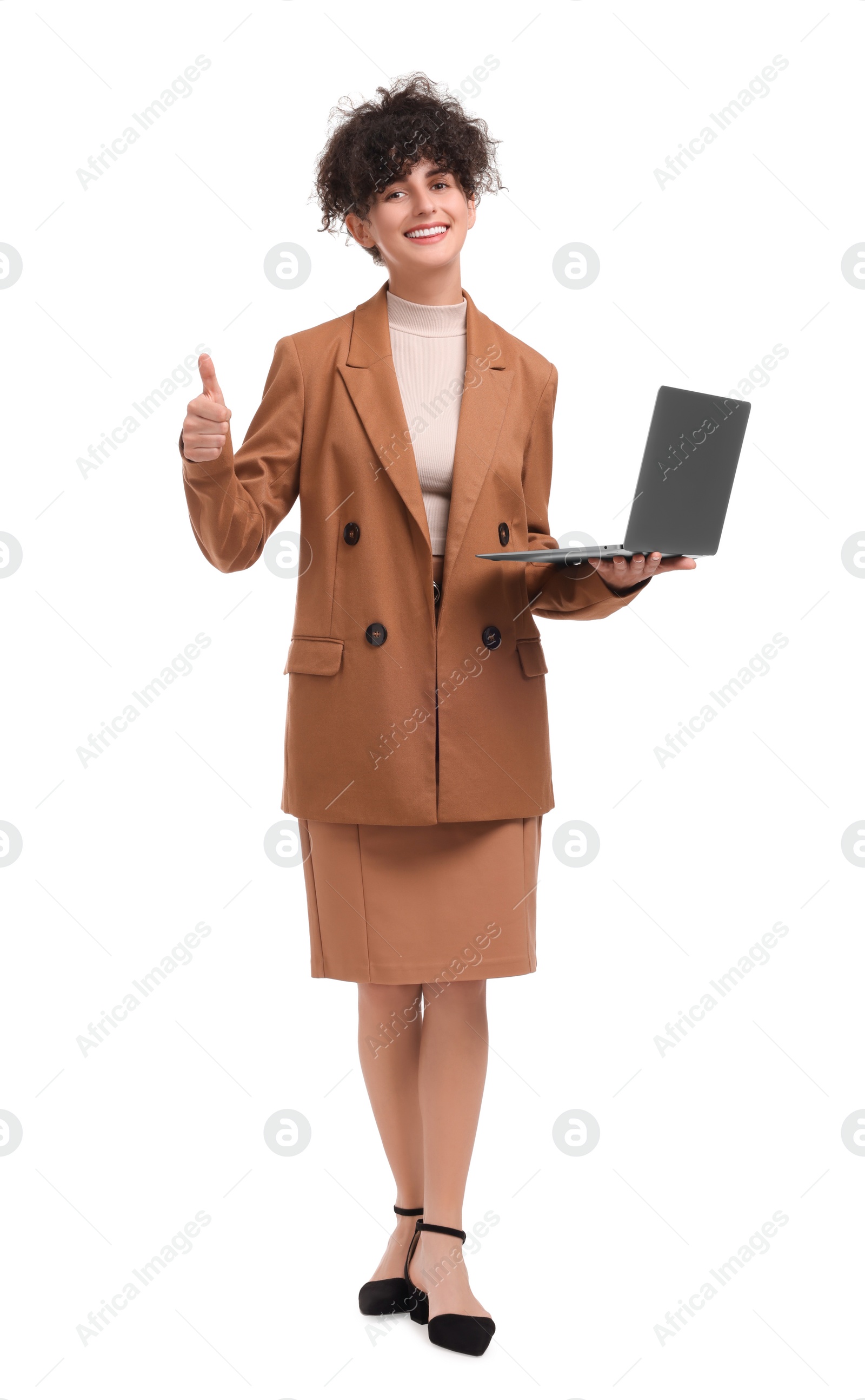 Photo of Beautiful happy businesswoman with laptop showing thumbs up on white background