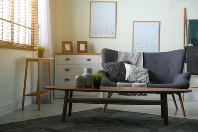 Photo of Contemporary living room interior with cozy sofa