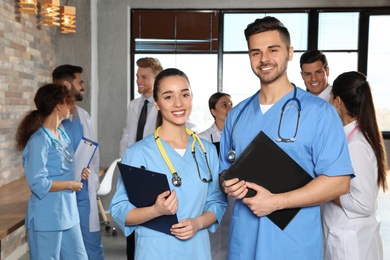 Photo of Portrait of medical workers indoors. Unity concept