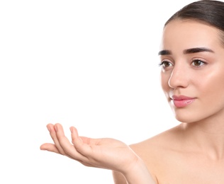 Photo of Portrait of young woman with beautiful face against white background