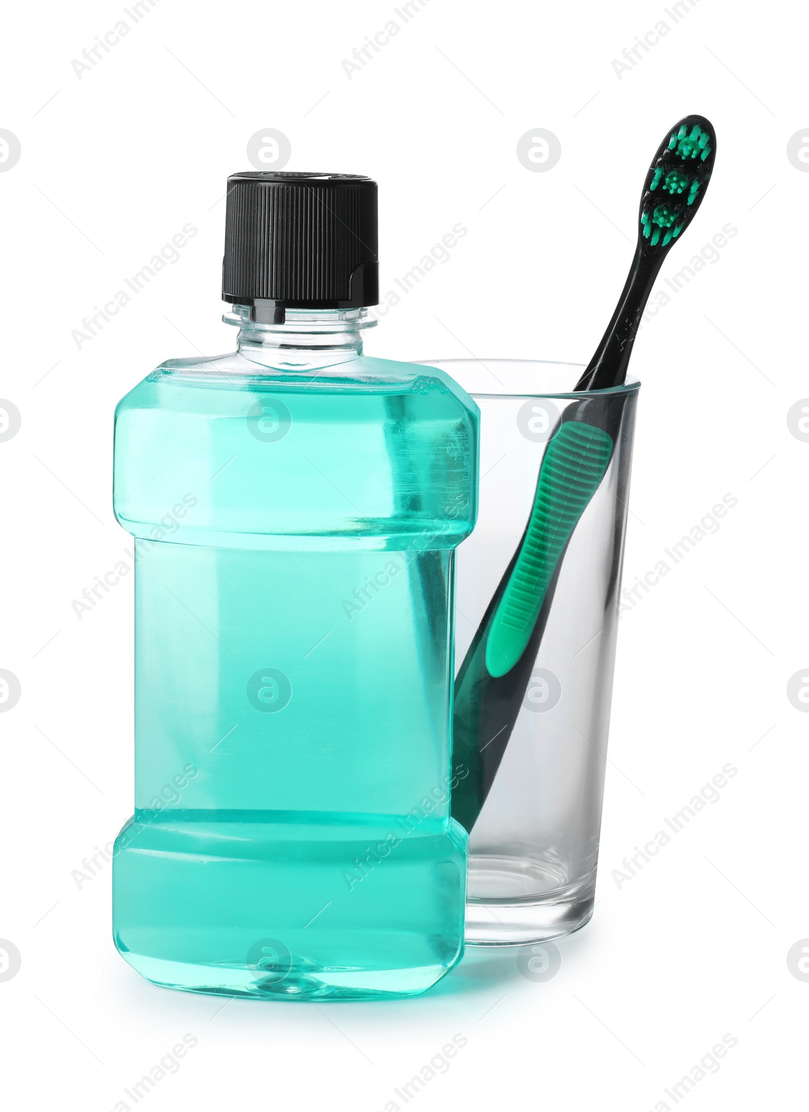 Photo of Mouthwash and other items for teeth care on white background