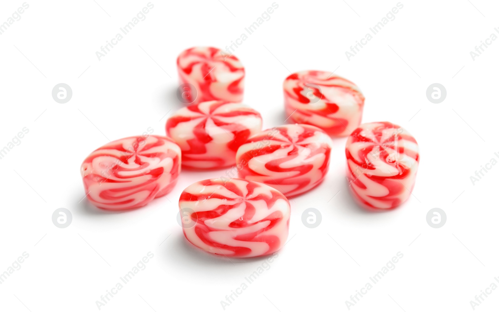 Photo of Delicious colorful candies on white background