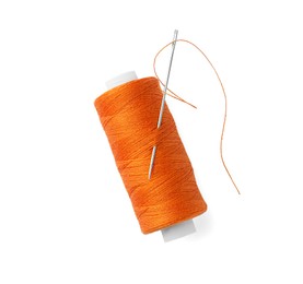 Photo of Spool of orange sewing thread with needle isolated on white, top view