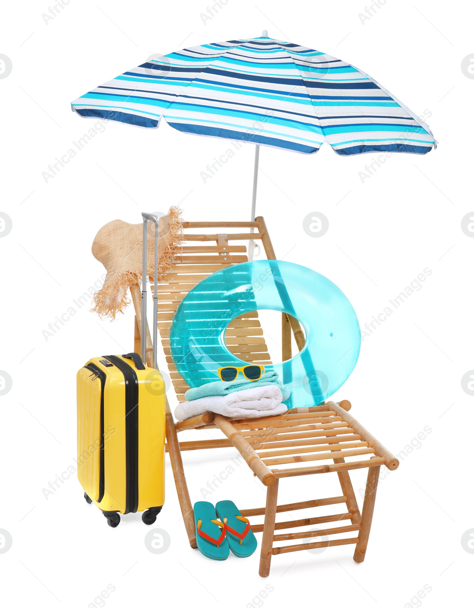 Deck chair, umbrella, suitcase and beach accessories isolated on white Photo of Deck chair, umbrella, suitcase and beach accessories isolated on white