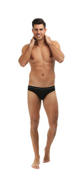 Photo of Handsome man in black underwear on white background