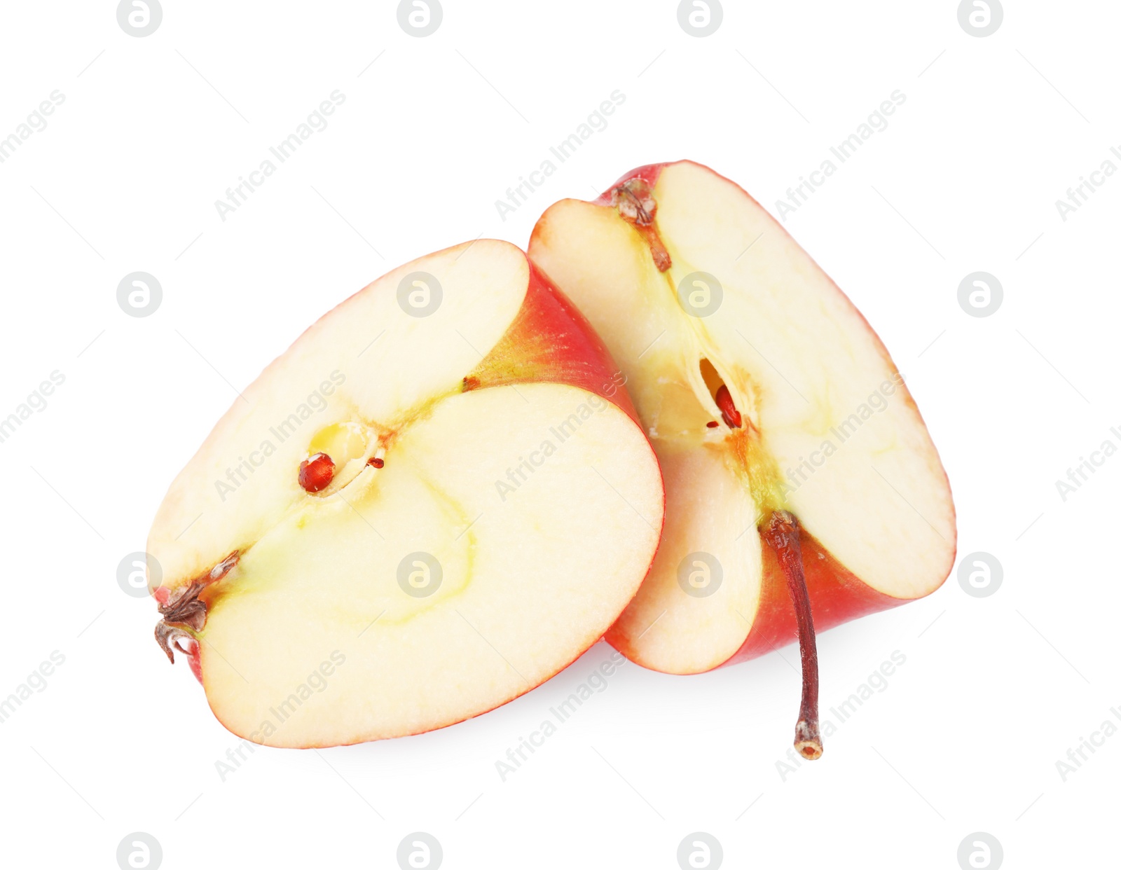 Pieces of ripe red apple isolated on white, top view Photo of Pieces of ripe red apple isolated on white, top view