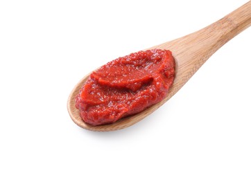 Photo of Wooden spoon of tasty tomato paste isolated on white