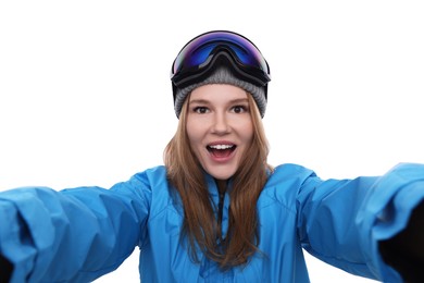 Photo of Emotional woman in ski goggles taking selfie on white background