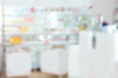 Pharmacy interior with different pharmaceuticals, blurred view