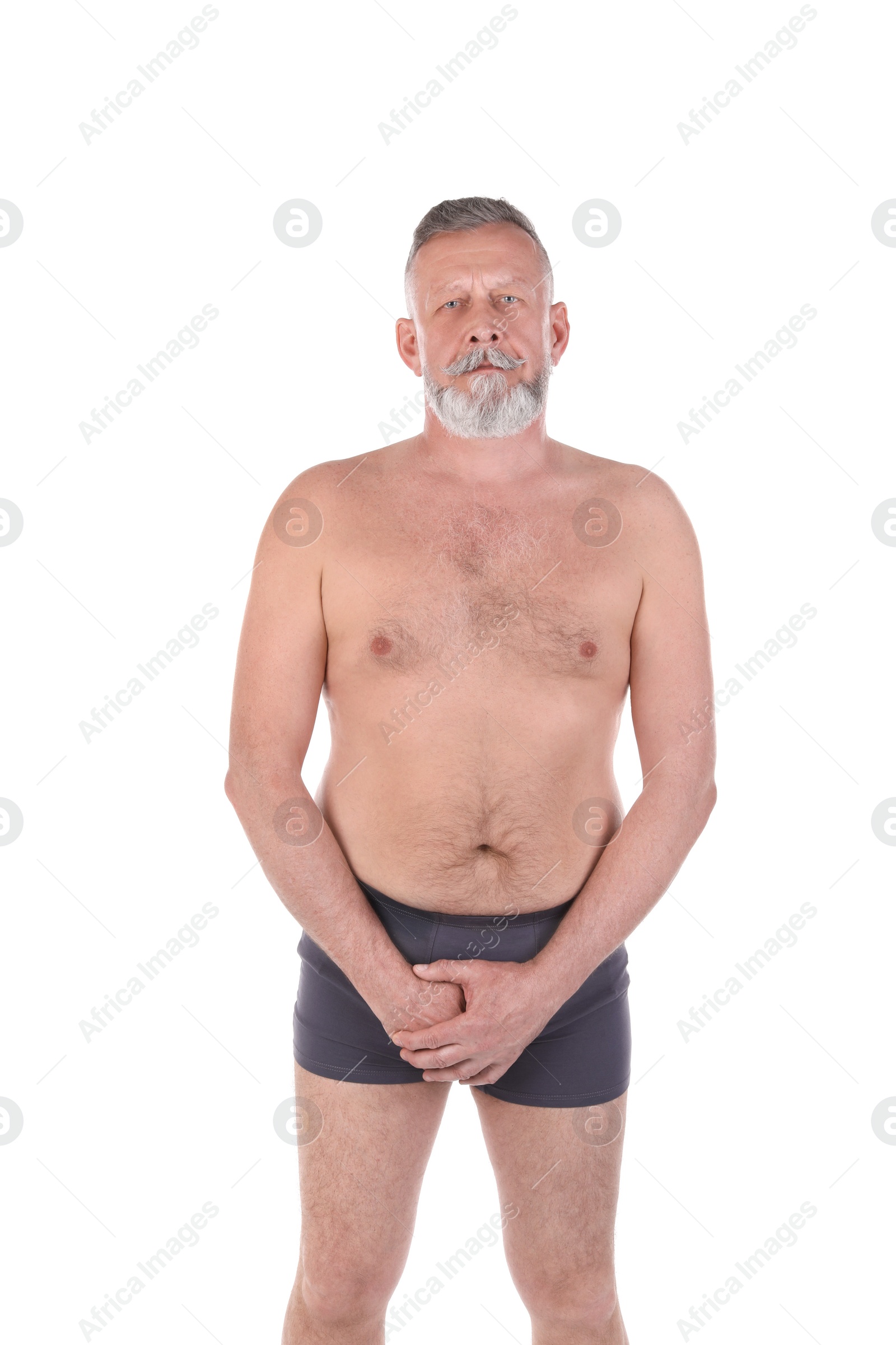 Photo of Mature man with urological problems on white background