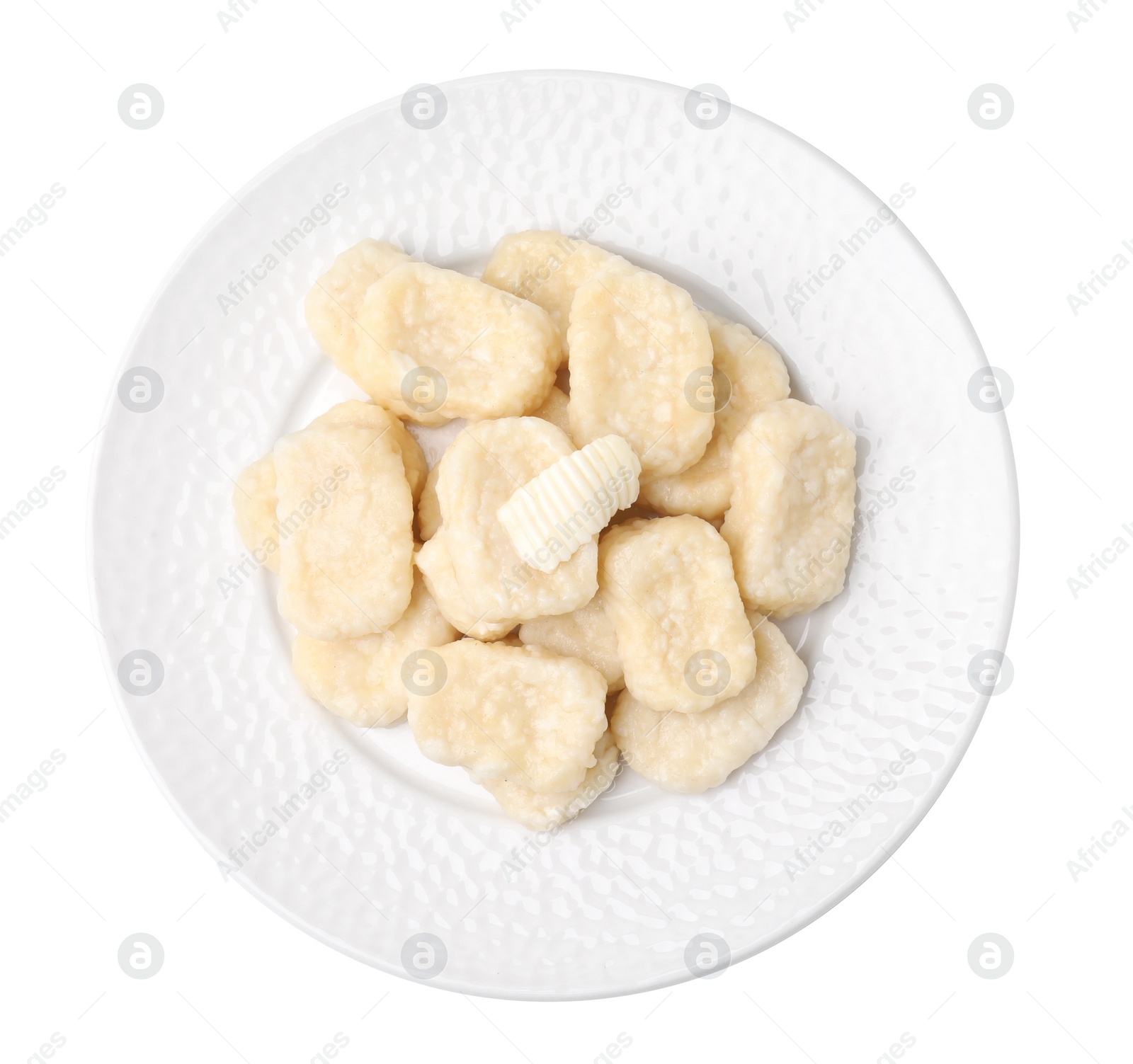 Photo of Plate of tasty lazy dumplings with butter isolated on white, top view