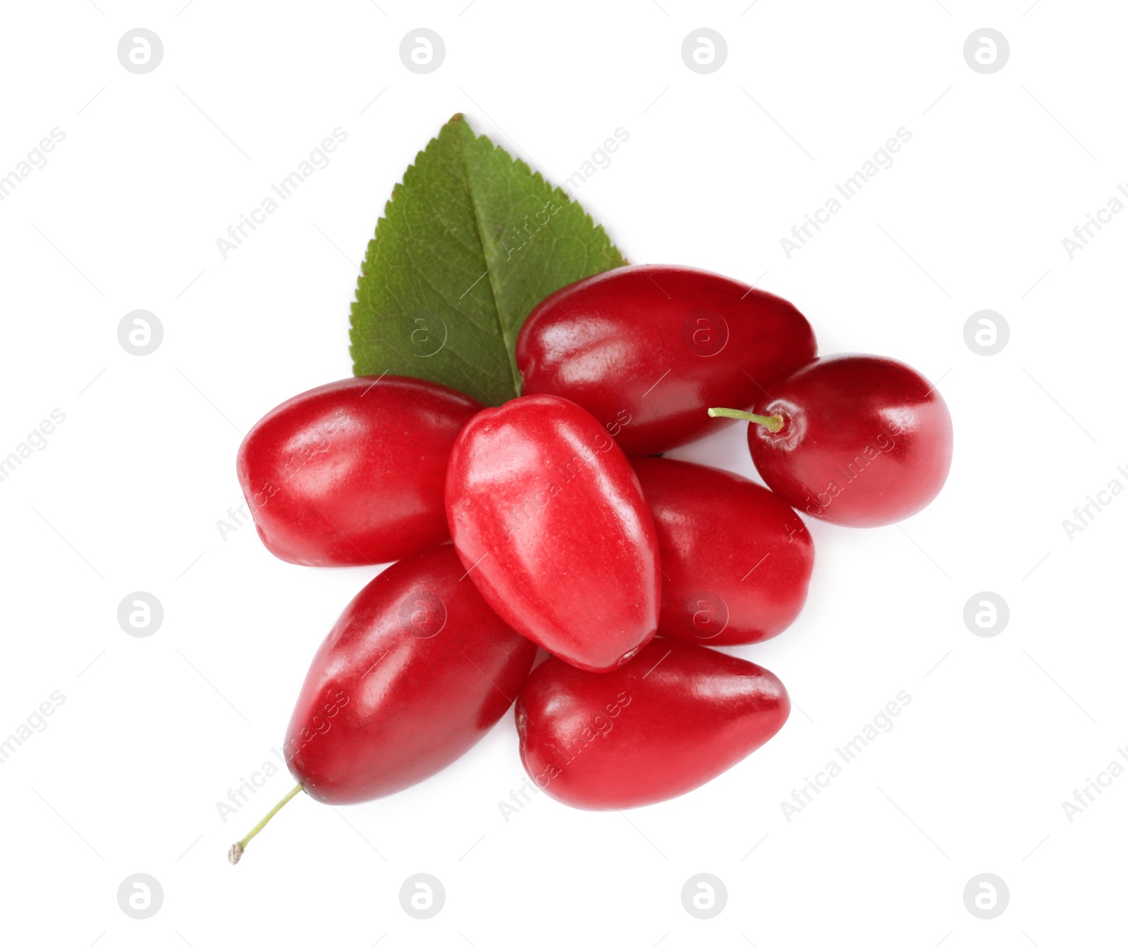 Photo of Pile of fresh ripe dogwood berries with green leaf on white background, top view