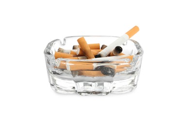 Glass ashtray with cigarette stubs isolated on white