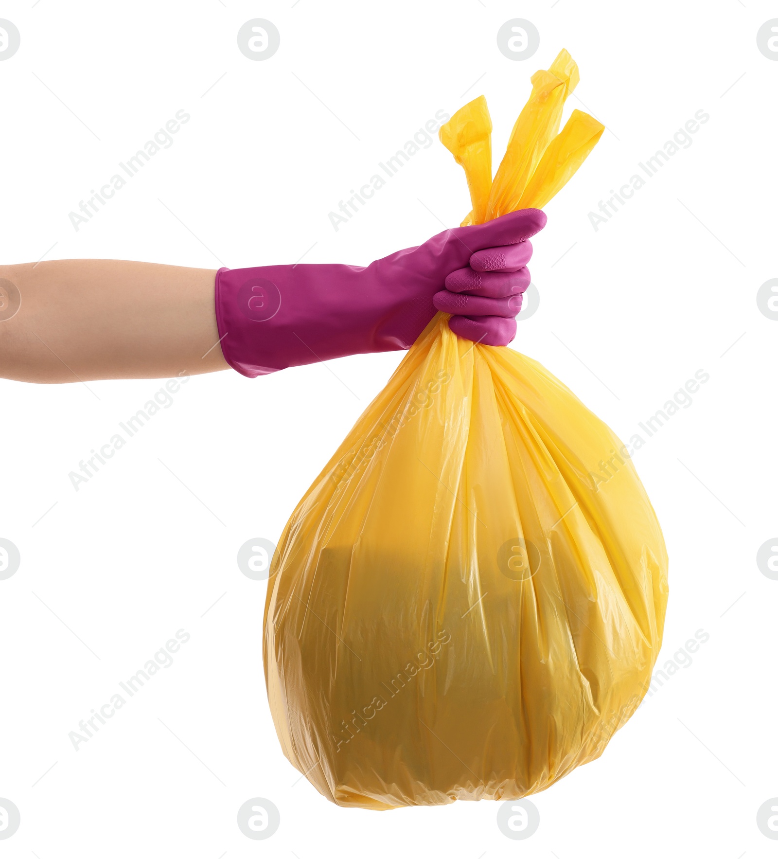 Photo of Woman holding plastic bag full of garbage on white background, closeup