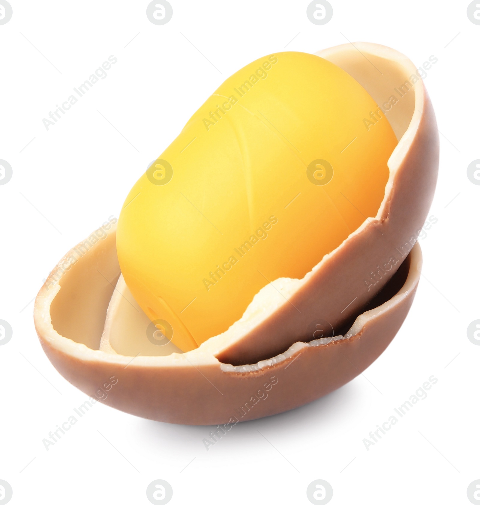 Photo of Slynchev Bryag, Bulgaria - May 25, 2023: Halves of Kinder Surprise Egg and plastic capsule with toy on white background