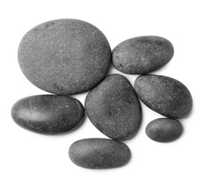 Photo of Group of different stones on white background, top view