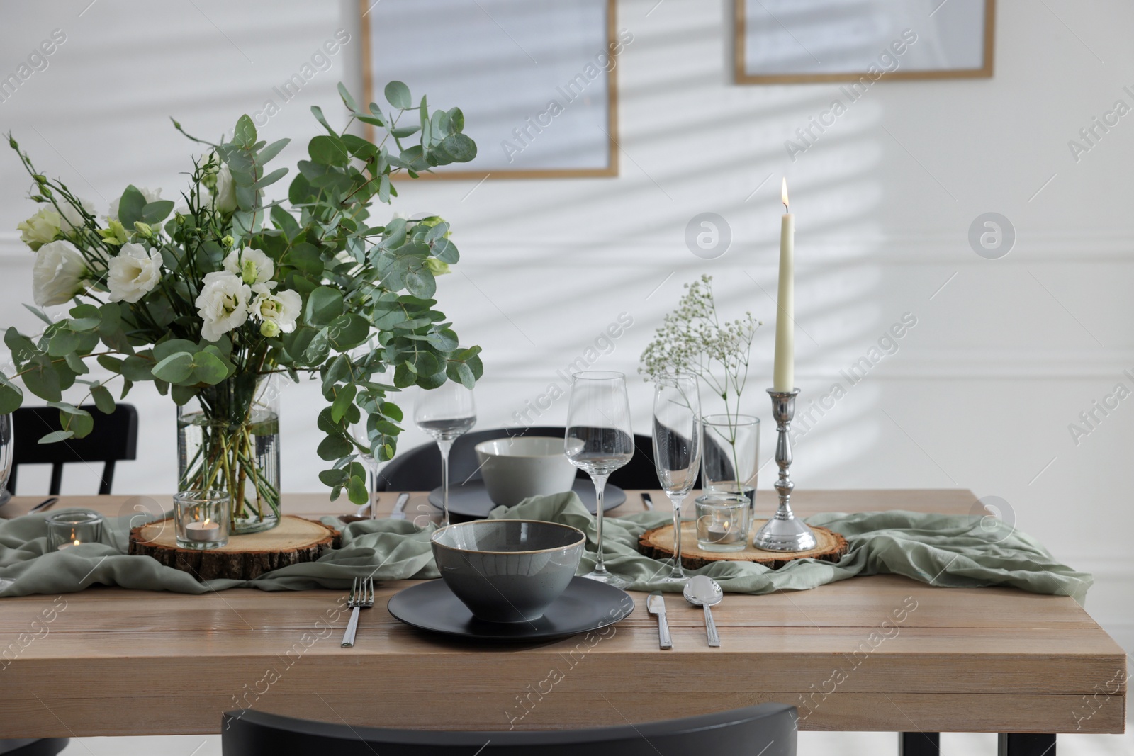 Photo of Festive table setting with beautiful tableware and decor indoors