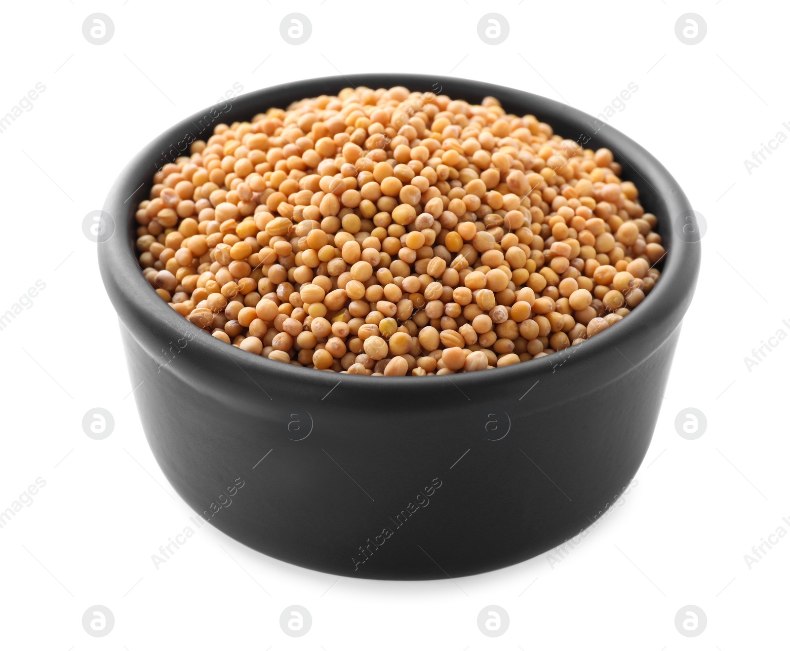 Photo of Mustard seeds in bowl isolated on white