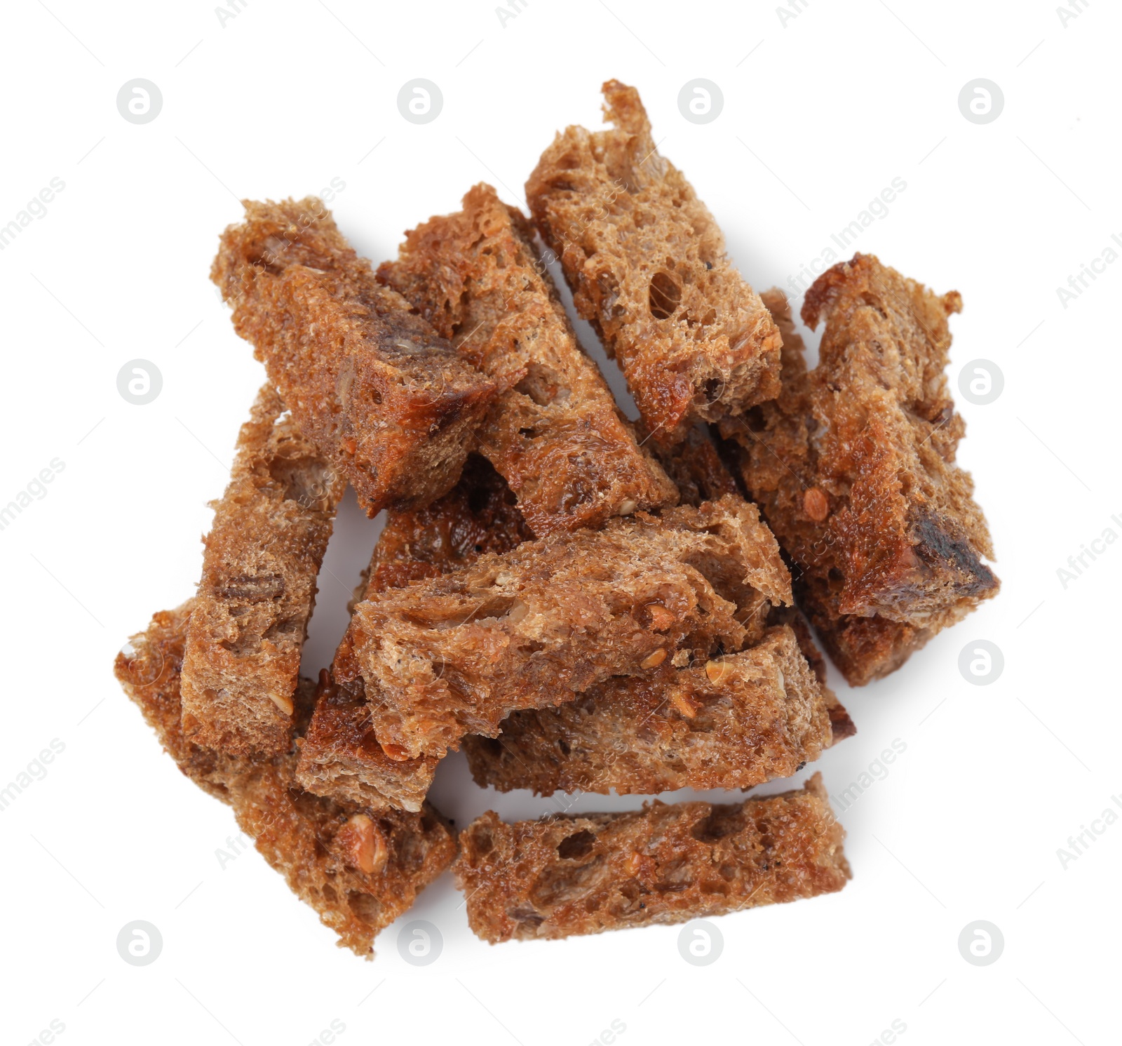 Photo of Delicious crispy rusks on white background, top view