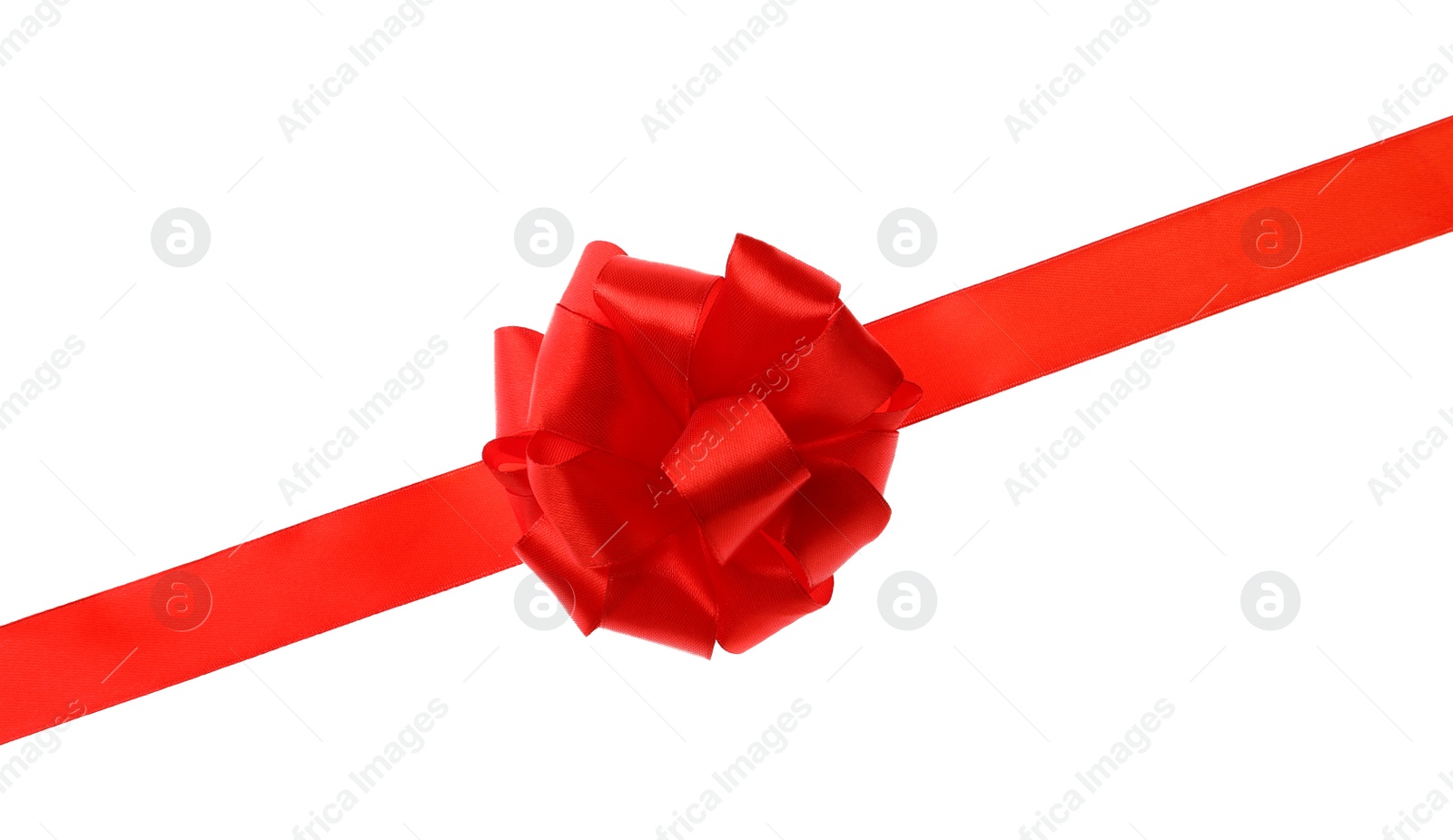 Photo of Red ribbon with bow on white background. Festive decoration