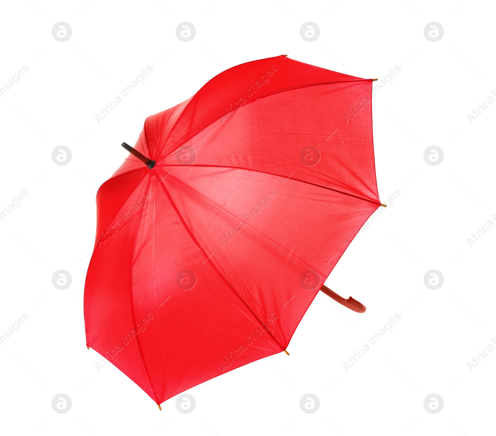 Photo of Modern opened red umbrella isolated on white