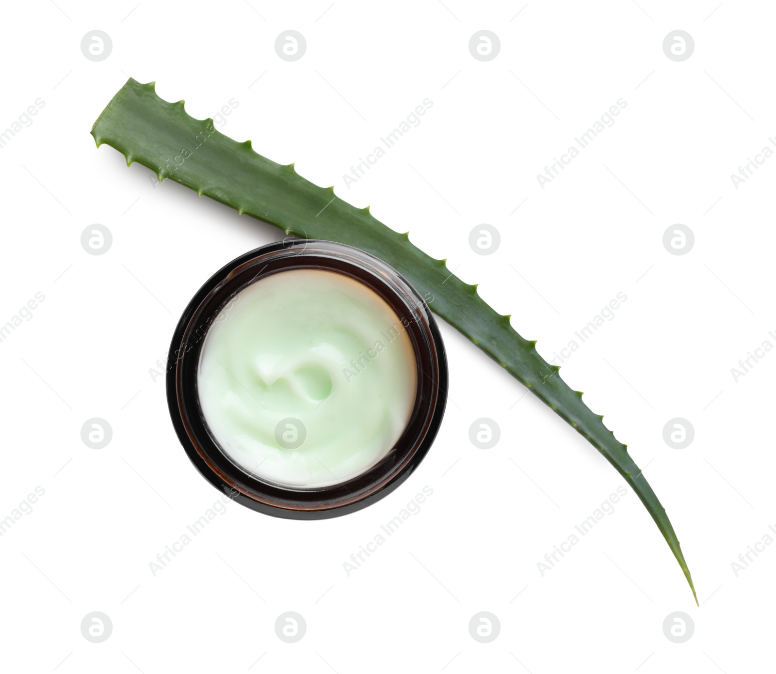 Photo of Jar of hand cream and aloe on white background, top view