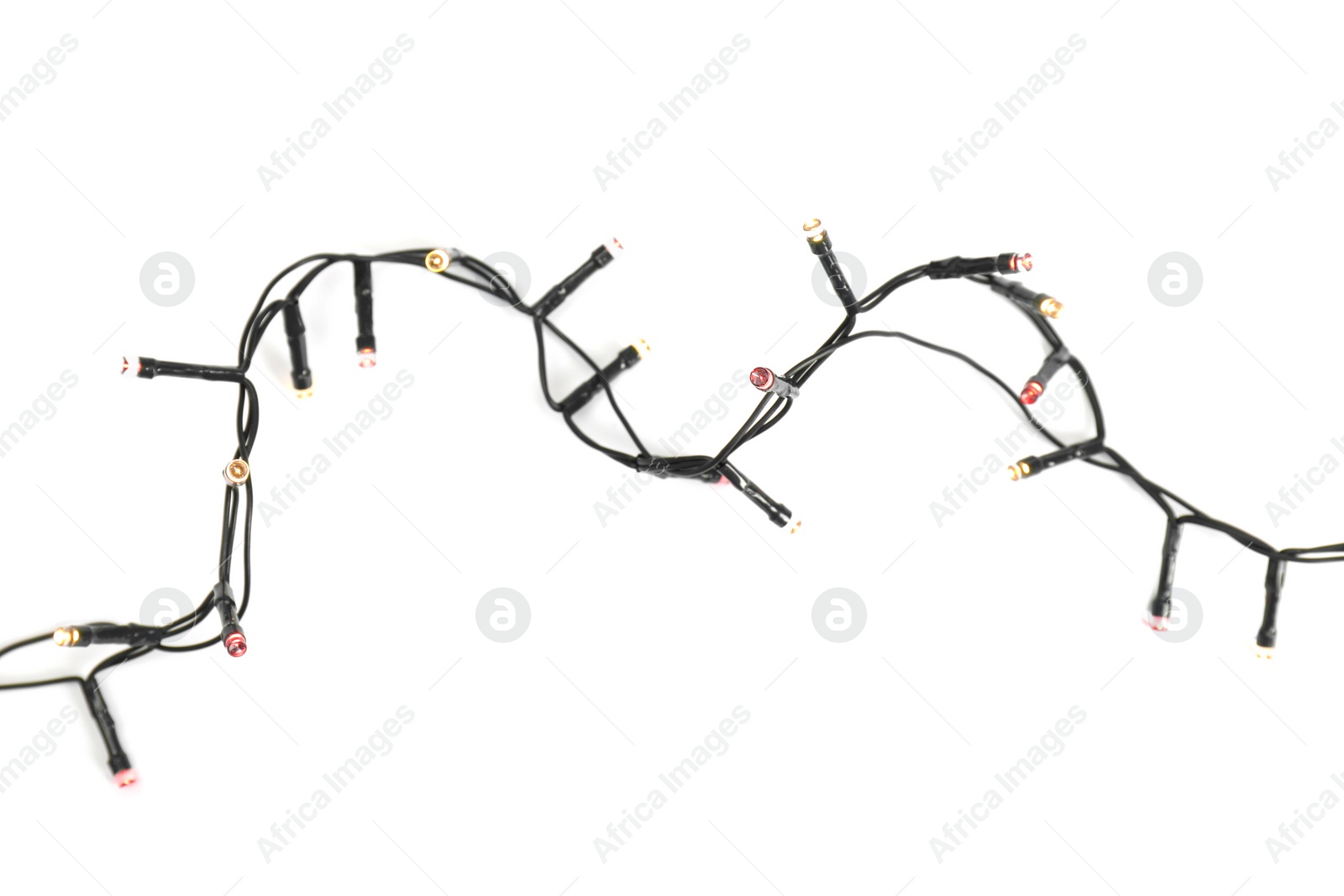 Photo of Beautiful Christmas lights on white background, top view