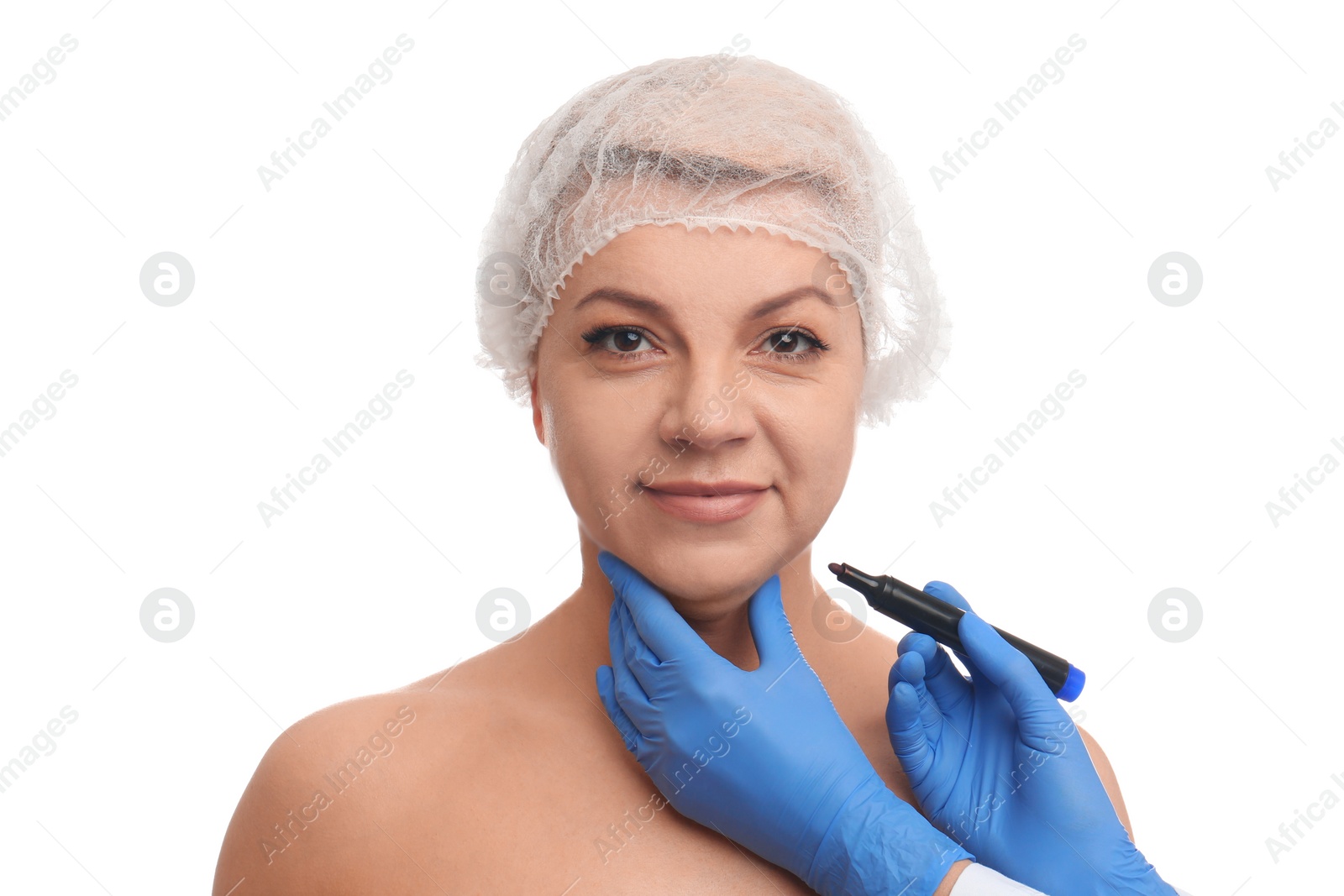 Photo of Surgeon with marker preparing woman for operation against white background. Double chin removal