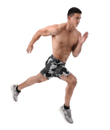 Photo of Athletic young man running on white background
