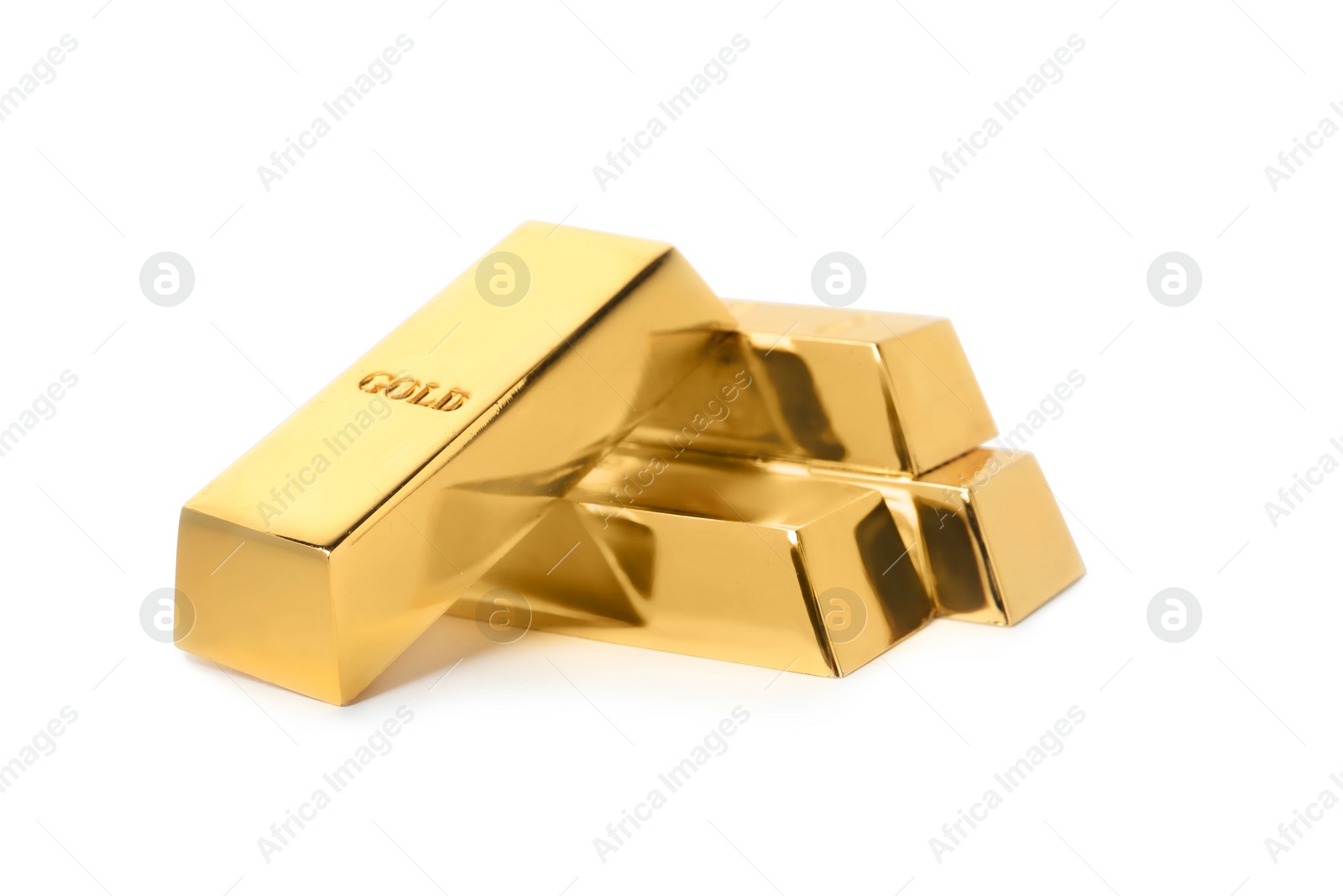 Photo of Precious shiny gold bars on white background