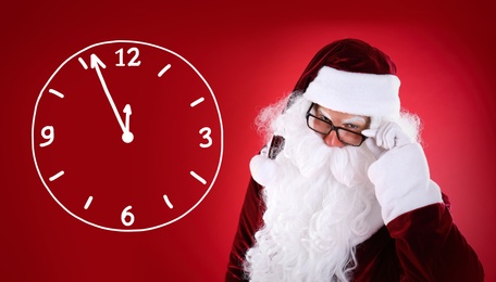 Image of Christmas countdown. Clock showing five minutes to midnight near Santa Claus on red background