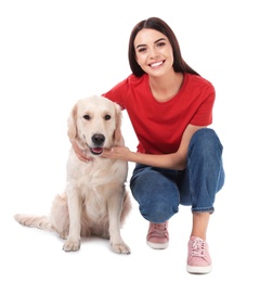 Young woman and her Golden Retriever dog on white background