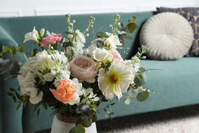 Photo of Beautiful bouquet of different fresh flowers indoors