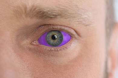 Closeup view of man with eyeball tattoo