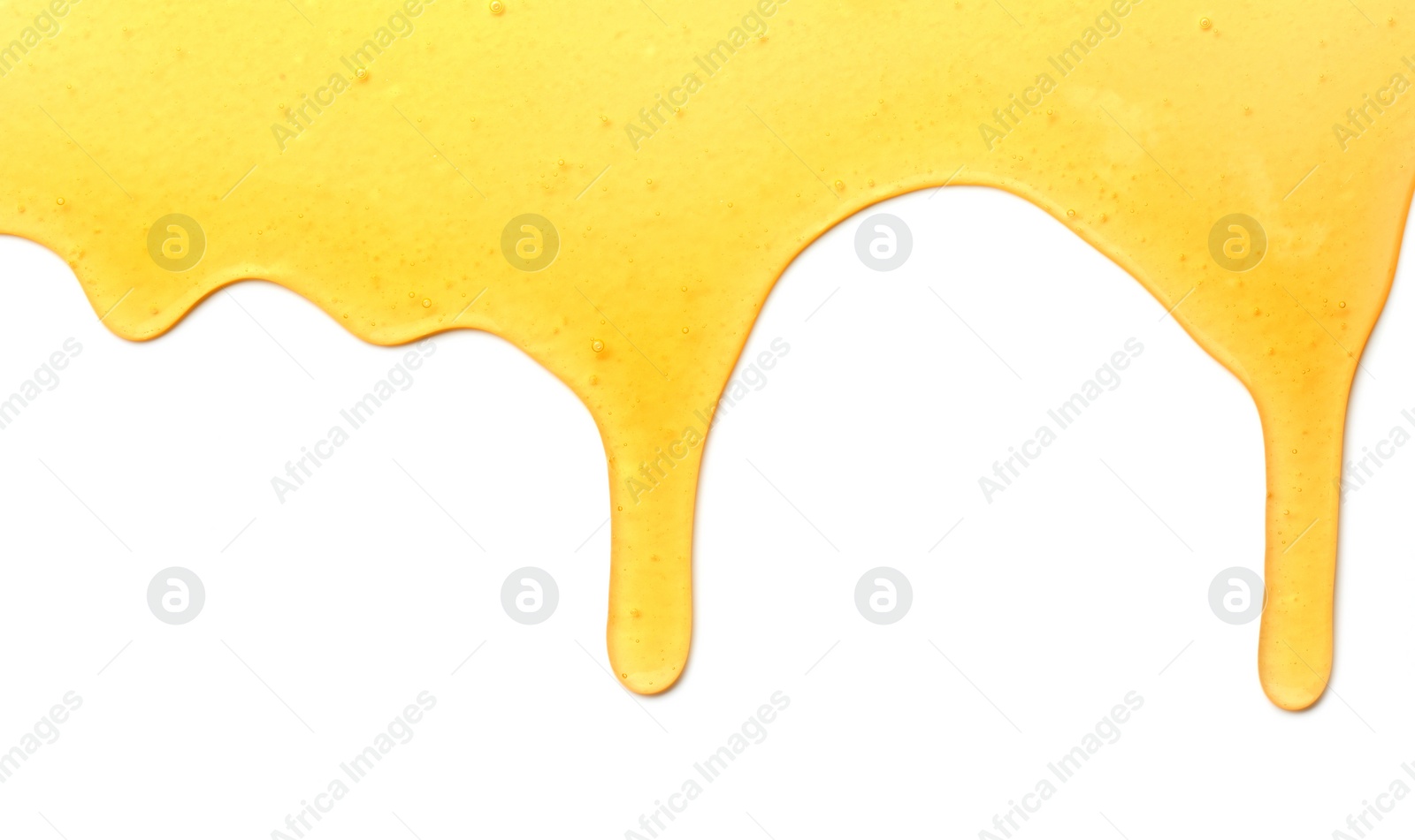 Photo of Tasty natural honey drips isolated on white, top view