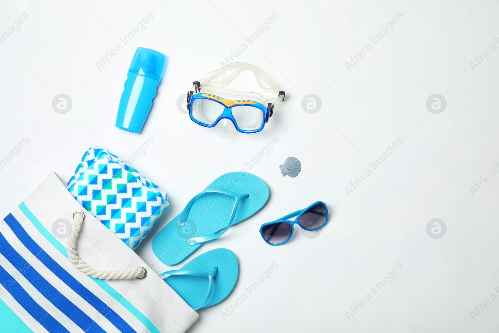 Photo of Composition with beach objects on white background