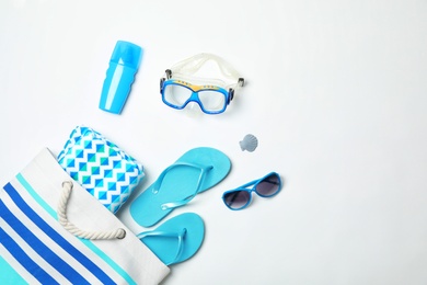 Composition with beach objects on white background