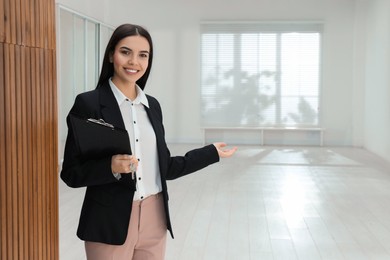 Female real estate agent showing new apartment