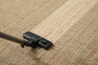 Image of Hoovering carpet with vacuum cleaner, space for text. Clean trace on dirty surface