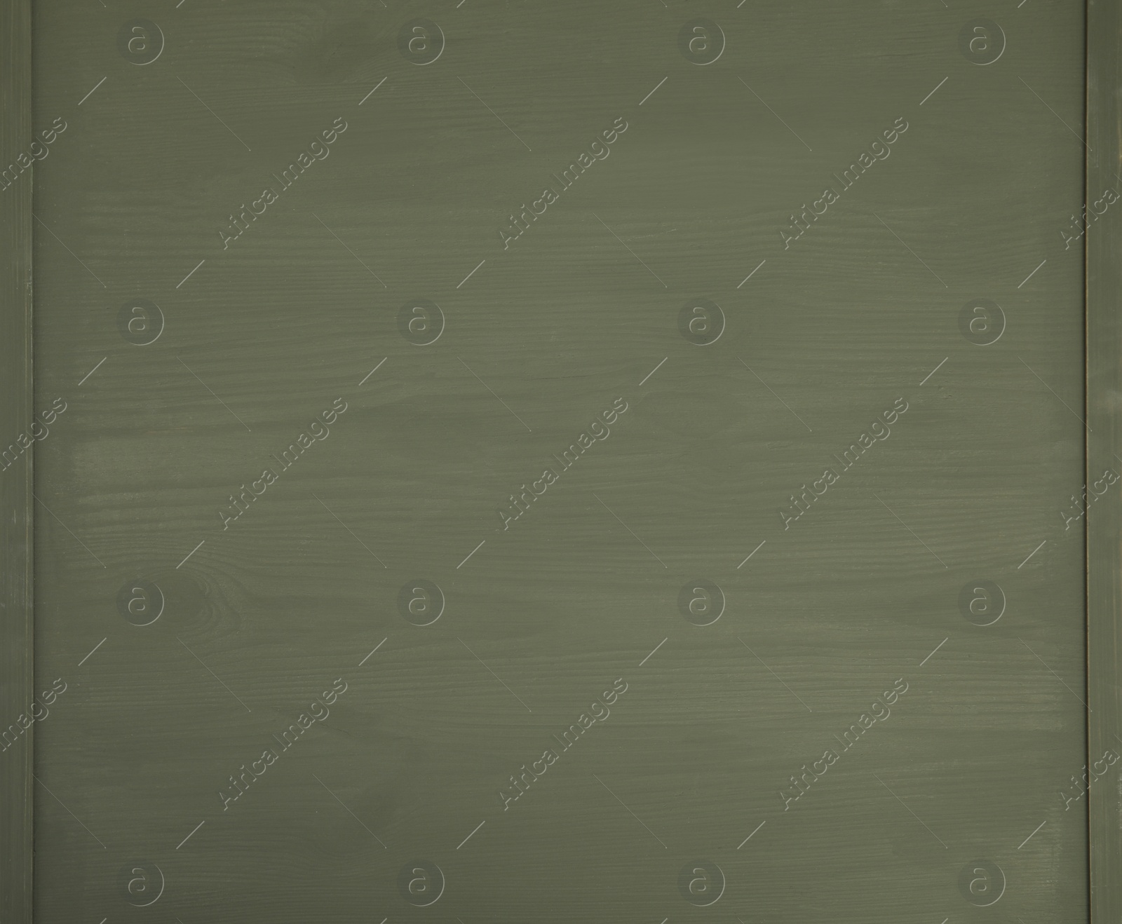 Photo of Texture of dark green wooden surface on table, top view