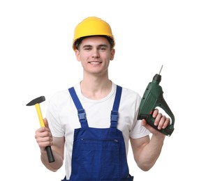 Professional repairman holding hammer and electric screwdriver on white background