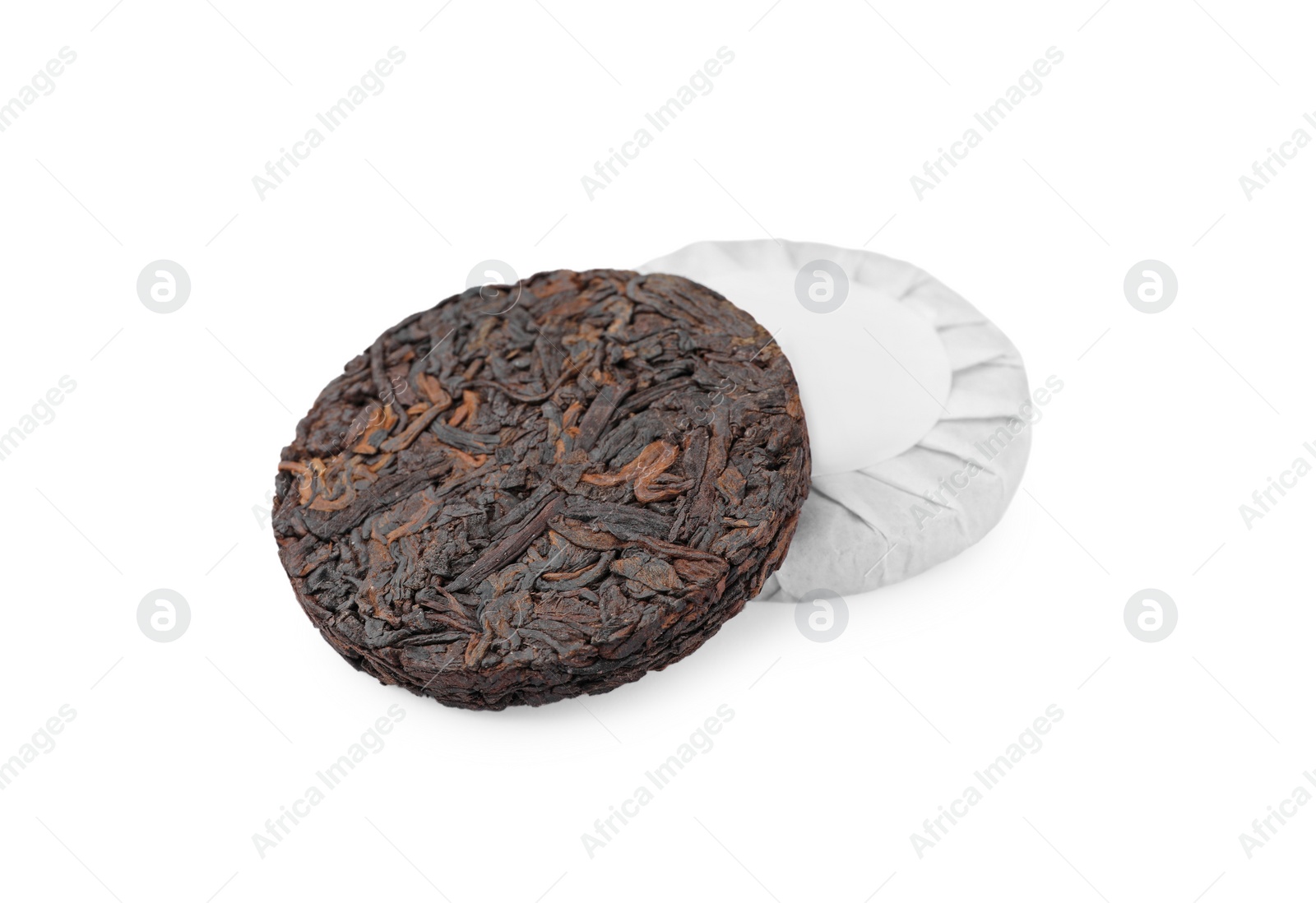 Photo of Disc shaped traditional Chinese pu-erh tea isolated on white