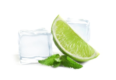 Slice of fresh ripe lime and ice cubes on white background