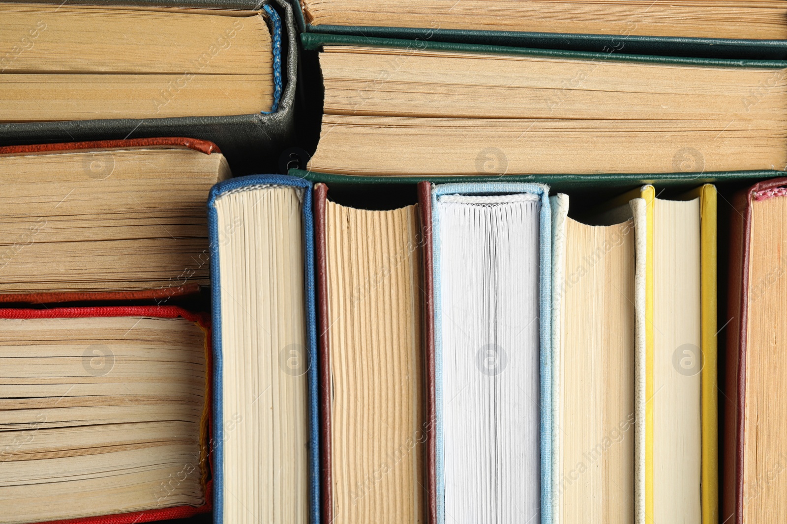 Photo of Many different hardcover books as background, top view