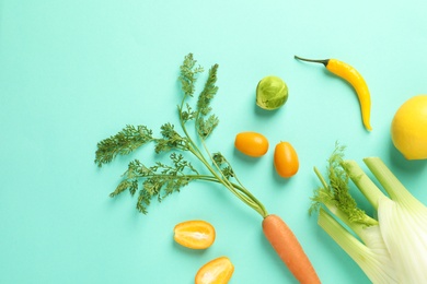 Photo of Flat lay composition with fresh fruits and vegetables on color background