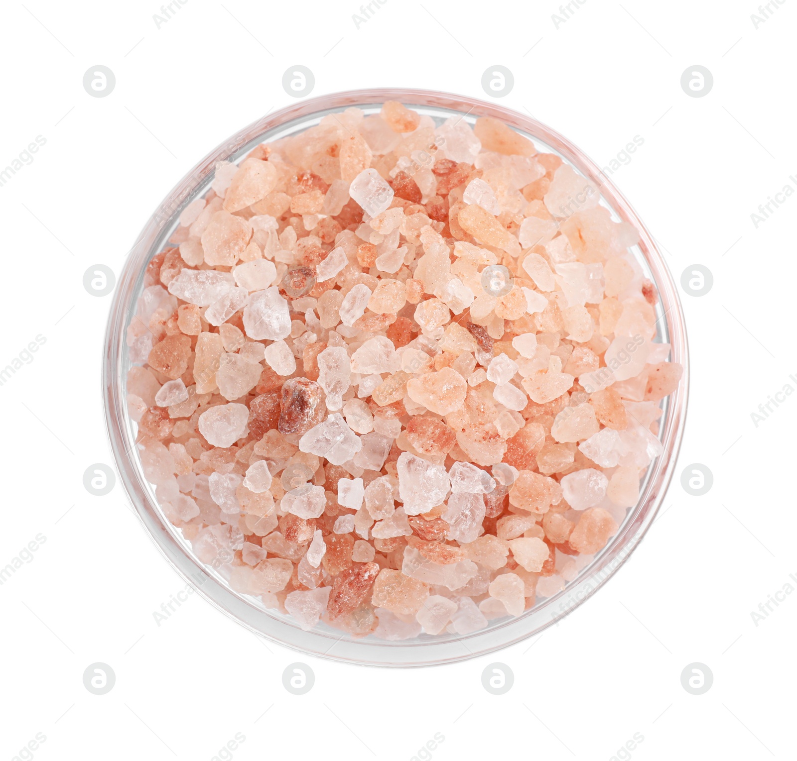 Photo of Pink Himalayan salt in glass bowl isolated on white, top view