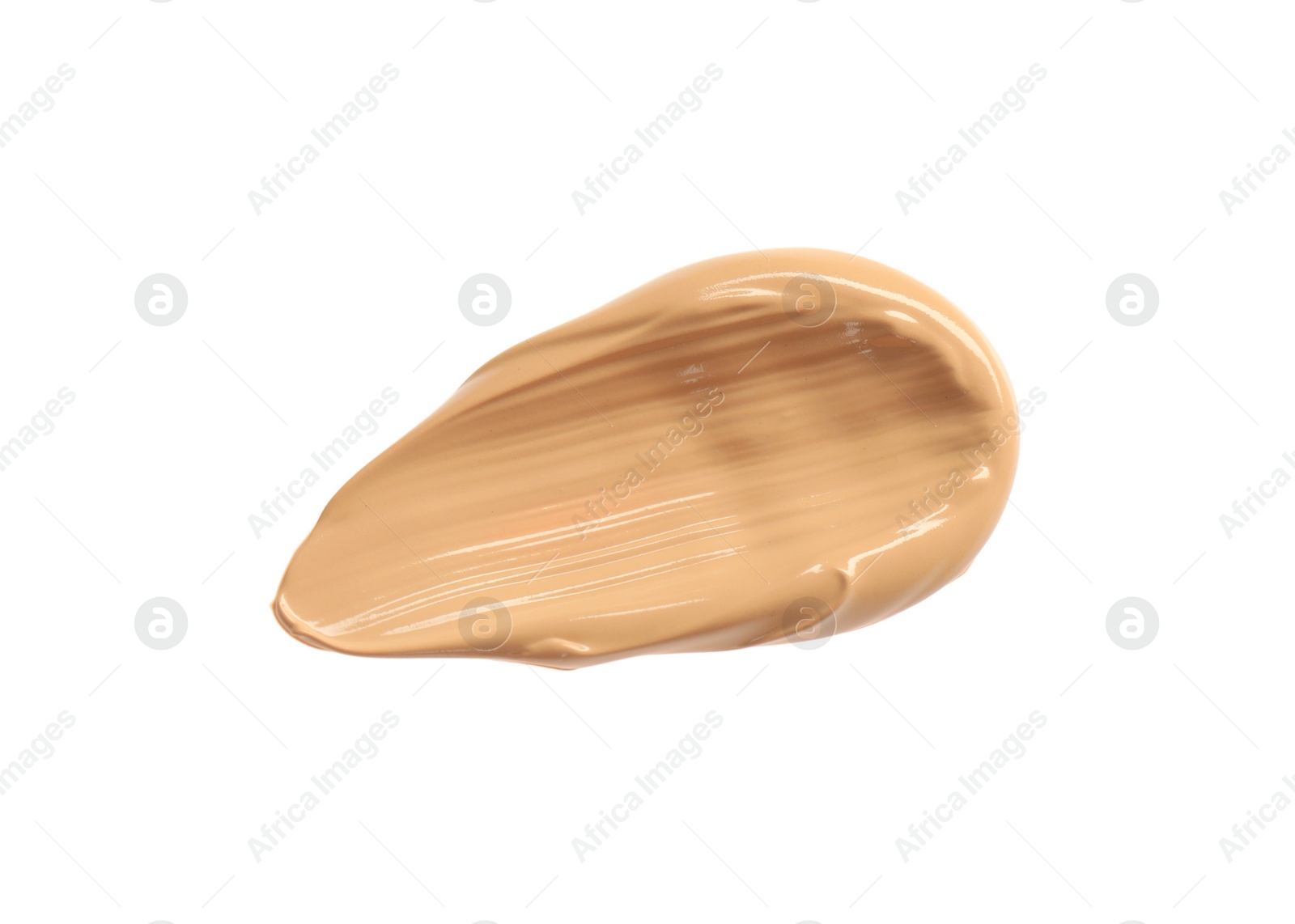 Photo of Smear of liquid skin foundation isolated on white, top view