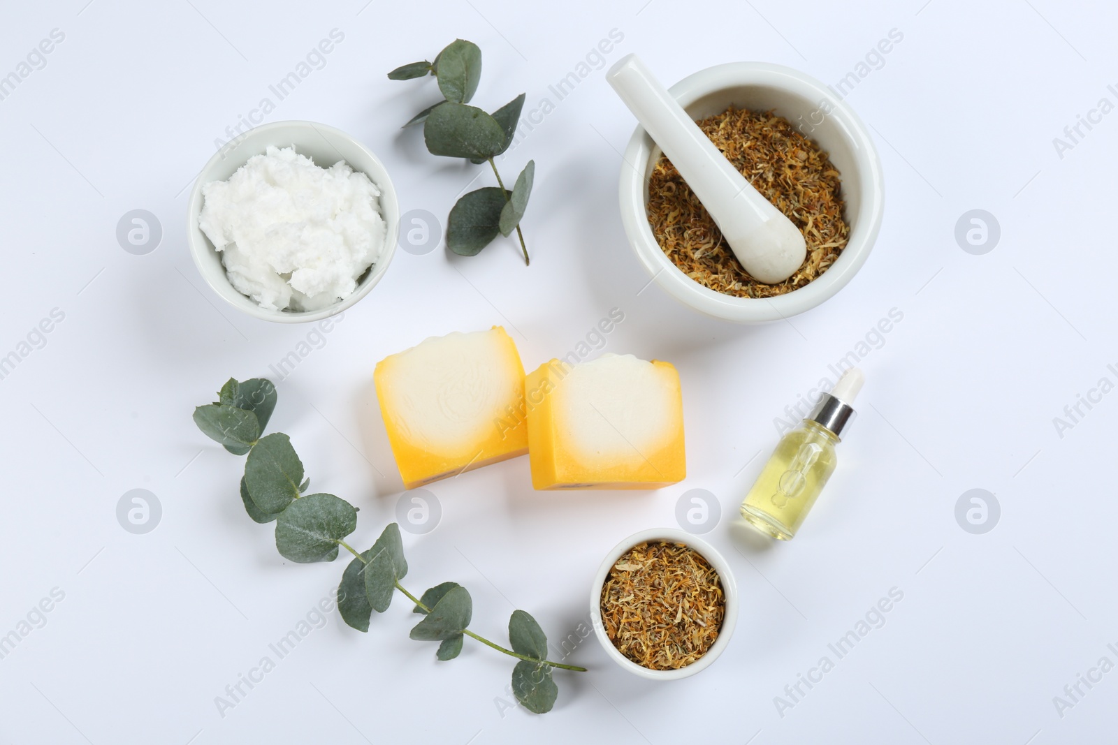 Photo of Flat lay composition with natural handmade soap and ingredients on white background