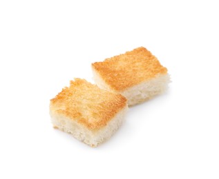 Photo of Two delicious crispy croutons on white background
